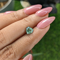 1.05 Ct. Yellowish Green Sapphire from Africa Life Style