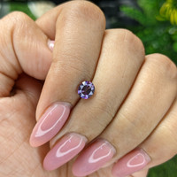 0.77 Ct. Pinkish Purple Sapphire from Madagascar Life Style
