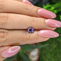 0.77 Ct. Pinkish Purple Sapphire from Madagascar Life Style