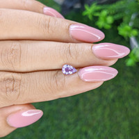 0.72 Ct. Pinkish Purple Sapphire from Ceylon (Sri Lanka) Life Style