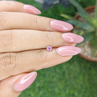 0.28 Ct. Pinkish Purple Sapphire from Ceylon (Sri Lanka) Life Style
