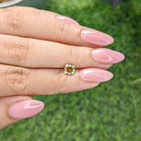 0.71 Ct. Greenish Yellow Sapphire from Ceylon (Sri Lanka) Life Style