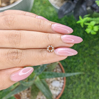 1.02 Ct. Yellowish Brown Sapphire from Madagascar Life Style
