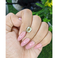 2.06 Ct. Yellowish Green Sapphire from Madagascar Life Style