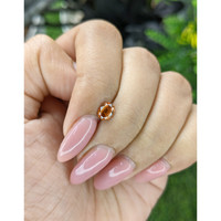 0.65 Ct. Padparadscha Sapphire from Madagascar Life Style