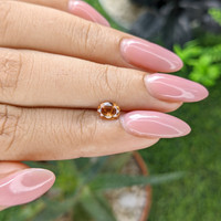 0.65 Ct. Padparadscha Sapphire from Madagascar Life Style