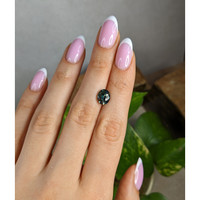 3.01 Ct. Bluish Green Sapphire from Madagascar Life Style