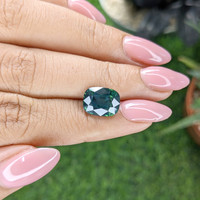 5.07 Ct. Bluish Green Sapphire from Kenya Life Style
