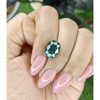 5.07 Ct. Bluish Green Sapphire from Kenya Life Style