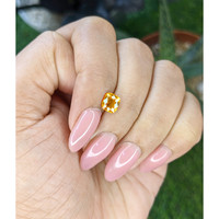 1.32 Ct. Yellowish Orange Sapphire from Ceylon (Sri Lanka) Life Style
