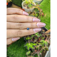0.63 Ct. Greenish Blue Sapphire from Ceylon (Sri Lanka) Life Style