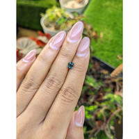 0.76 Ct. Greenish Blue Sapphire from Ceylon (Sri Lanka) Life Style