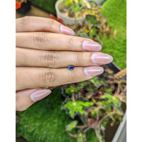 0.59 Ct. Greenish Blue Sapphire from Ceylon (Sri Lanka) Life Style