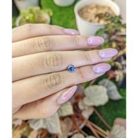 0.78 Ct. Greenish Blue Sapphire from Madagascar Life Style