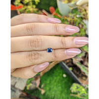 0.56 Ct. Greenish Blue Sapphire from Madagascar Life Style