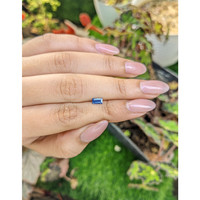 0.47 Ct. Greenish Blue Sapphire from Madagascar Life Style