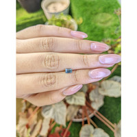 0.62 Ct. Greenish Blue Sapphire from Madagascar Life Style