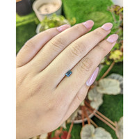 0.62 Ct. Greenish Blue Sapphire from Madagascar Life Style