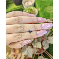 0.54 Ct. Greenish Blue Sapphire from Ceylon (Sri Lanka) Life Style