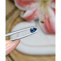 0.54 Ct. Greenish Blue Sapphire from Ceylon (Sri Lanka) Life Style