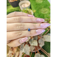 0.68 Ct. Greenish Blue Sapphire from Madagascar Life Style