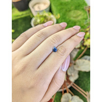 0.68 Ct. Greenish Blue Sapphire from Madagascar Life Style