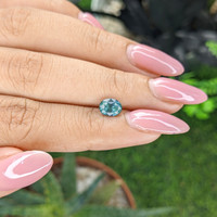 1.20 Ct. Greenish Blue Sapphire from Madagascar Life Style