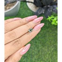 1.05 Ct. Yellowish Green Sapphire from Madagascar Life Style