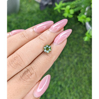 1.59 Ct. Yellowish Green Sapphire from Madagascar Life Style