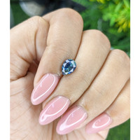 1.22 Ct. Greenish Blue Sapphire from Madagascar Life Style