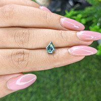 1.51 Ct. Bluish Green Sapphire from Madagascar Life Style