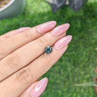 1.53 Ct. Bluish Green Sapphire from Madagascar Life Style