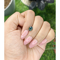 1.53 Ct. Bluish Green Sapphire from Madagascar Life Style