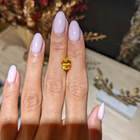 3.23 Ct. Orangish Yellow Sapphire from Ceylon (Sri Lanka) Life Style