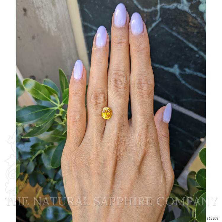 3.23 Ct. Orangish Yellow Sapphire from Ceylon (Sri Lanka)