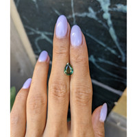 2.03 Ct. Yellowish Green Sapphire from Madagascar Life Style