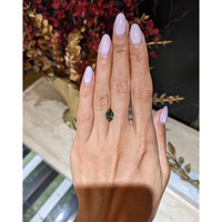 2.03 Ct. Yellowish Green Sapphire from Madagascar Life Style