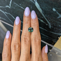 2.81 Ct. Bluish Green Sapphire from Madagascar Life Style