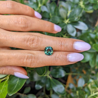 2.81 Ct. Bluish Green Sapphire from Madagascar Life Style