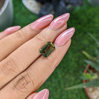 2.99 Ct. Yellowish Green Sapphire from Madagascar Life Style
