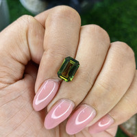 2.99 Ct. Yellowish Green Sapphire from Madagascar Life Style