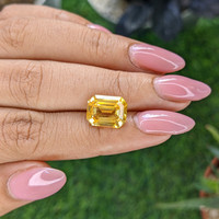6.48 Ct. Orangish Yellow Sapphire from Ceylon (Sri Lanka) Life Style