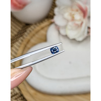 0.56 Ct. Greenish Blue Sapphire from Madagascar Life Style
