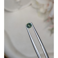 0.28 Ct. Yellowish Green Sapphire from Ceylon (Sri Lanka) Life Style