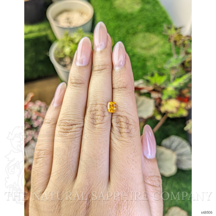 0.98 Ct. Orangish Yellow Sapphire from Ceylon (Sri Lanka)
