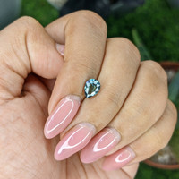 1.01 Ct. Bluish Green Sapphire from Madagascar Life Style