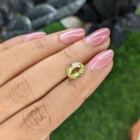 2.09 Ct. Greenish Yellow Sapphire from Madagascar Life Style