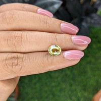 2.09 Ct. Greenish Yellow Sapphire from Madagascar Life Style