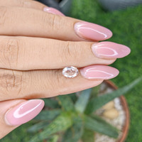 1.07 Ct. Peach Sapphire from Madagascar Life Style