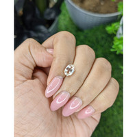 1.72 Ct. Peach Sapphire from Madagascar Life Style